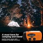 Oranges Kurbelradio in einer Campingszene